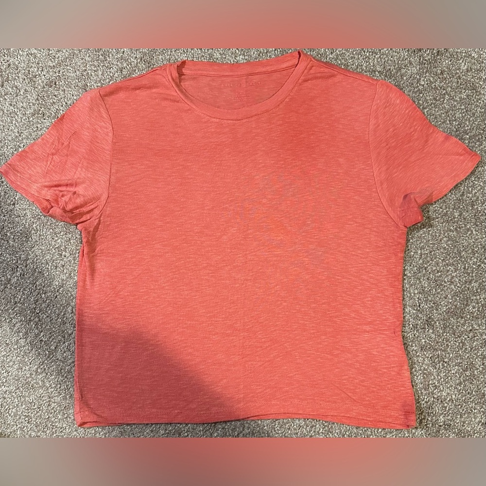 American eagle crew neck baby tee, orange. Size: Medium